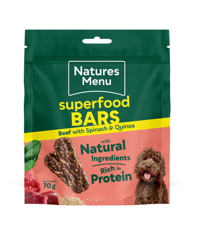 Natures Menu superfood bars packaging with a green background and dog illustration.