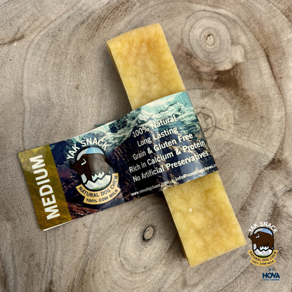 Yak Snack natural dog chew on a wooden surface