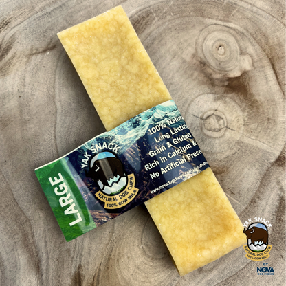 Yak Snack natural dog chew on a wooden surface