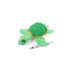 Green turtle plush toy on a white background