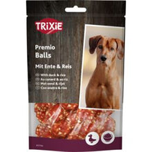 Packaging of Trixie Premio Balls dog treats with duck and rice, featuring an image of a dog and the product visible through a cut-out window.
